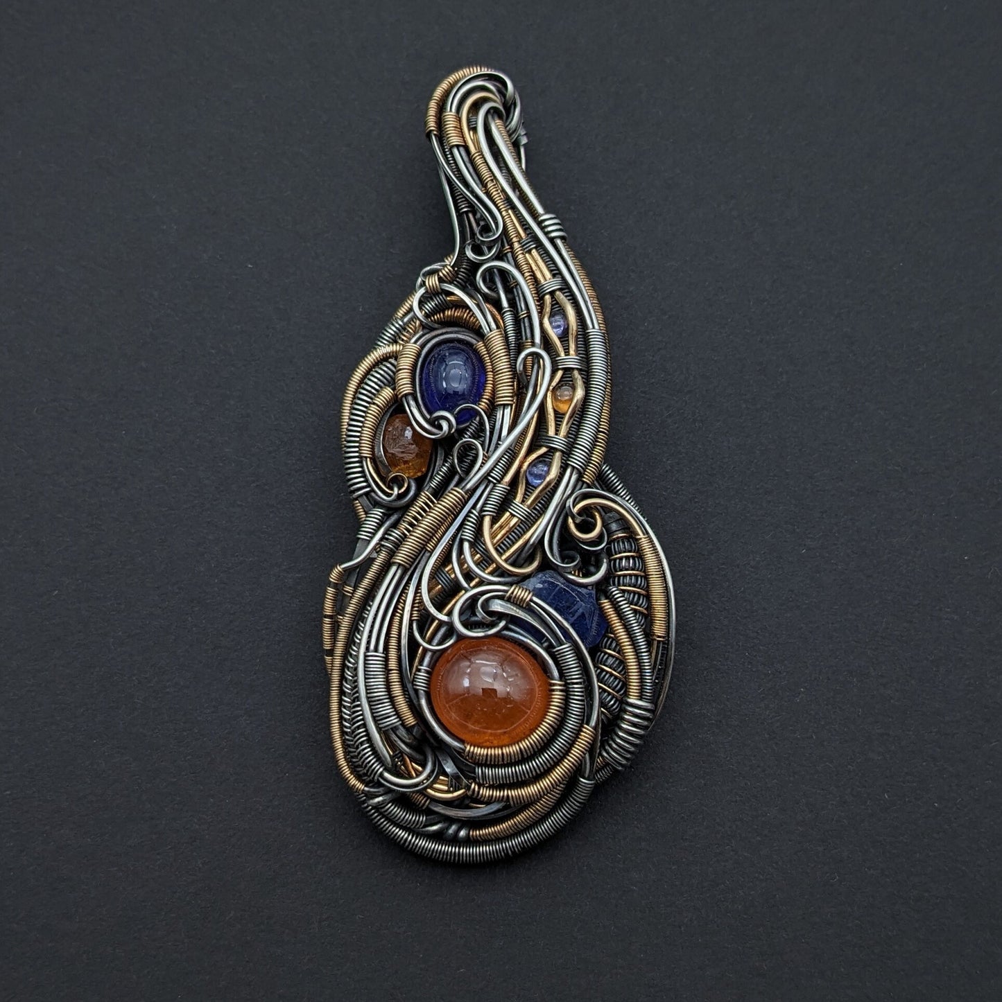 Tanzanite with Spessartine Garnet Pendant Made with Sterling Silver and Gold Fill Accents.