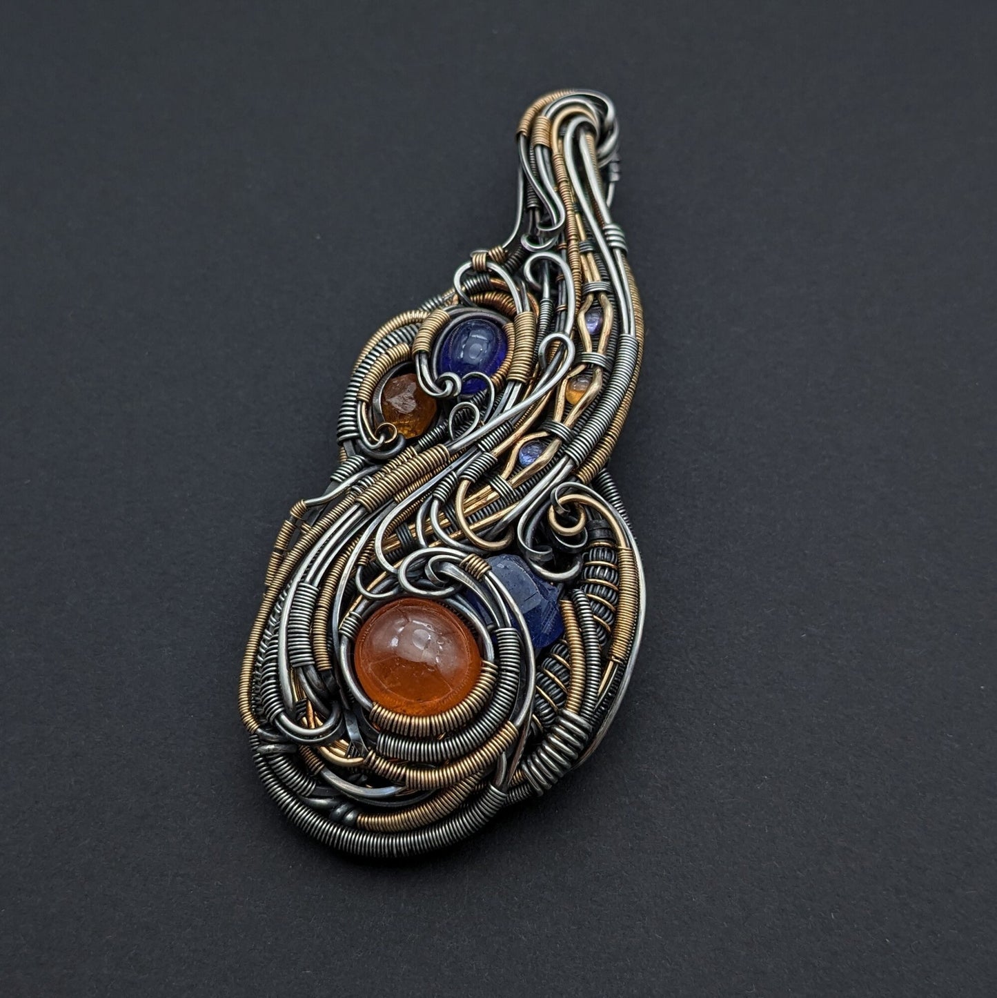 Tanzanite with Spessartine Garnet Pendant Made with Sterling Silver and Gold Fill Accents.