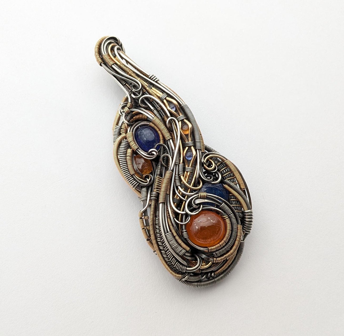 Tanzanite with Spessartine Garnet Pendant Made with Sterling Silver and Gold Fill Accents.