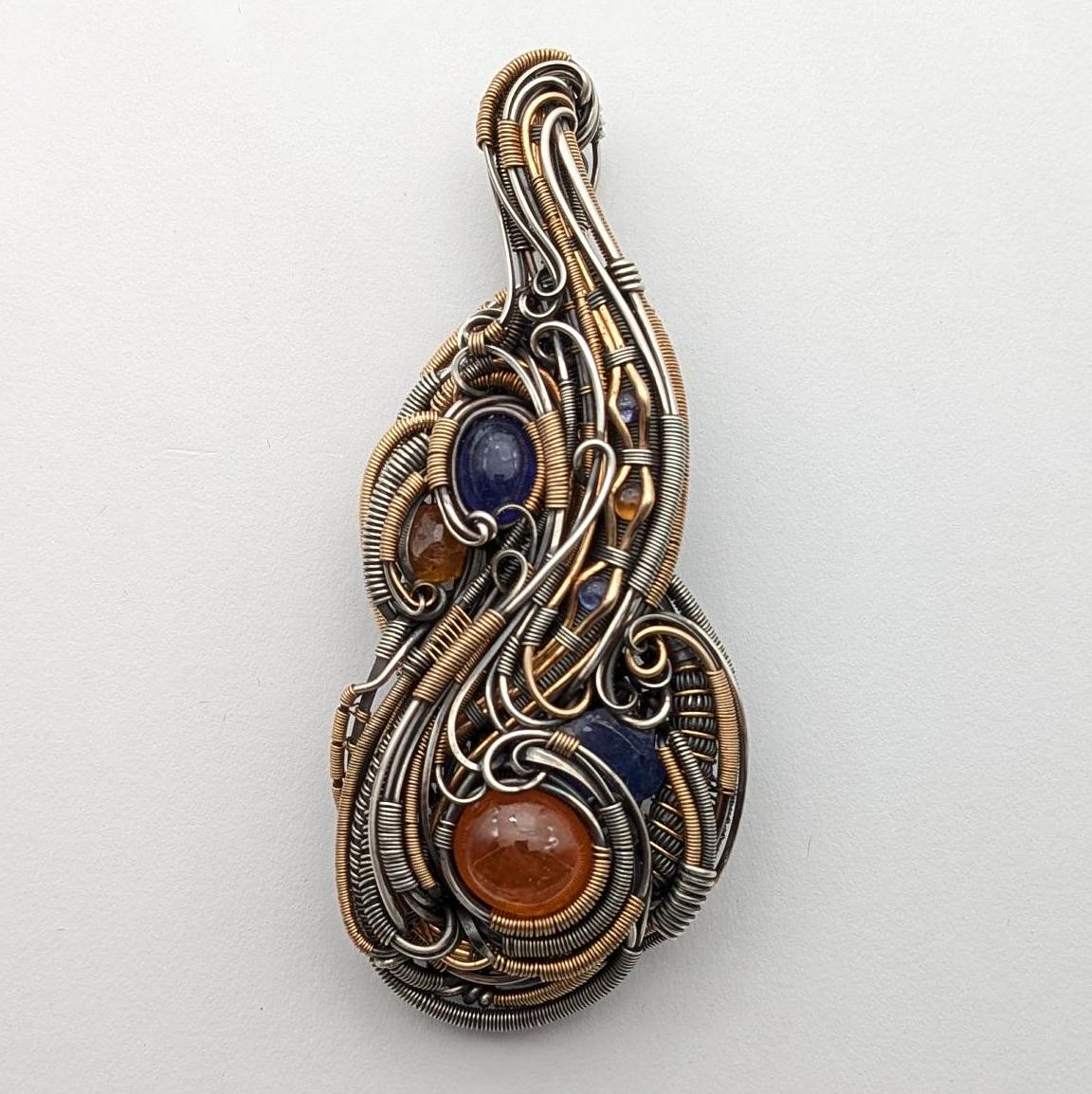 Tanzanite with Spessartine Garnet Pendant Made with Sterling Silver and Gold Fill Accents.